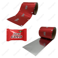 Rollo de película de laminación en frío de plástico suave de lámina holográfica BOPP para rollo de película de embalaje Flexible de gelatina de Chocolate y caramelo de goma