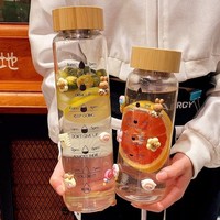 Elegante botella de agua de vidrio con tapa de madera, gran capacidad, rastreador de hidratación para viajes y uso diario.