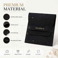 Pochette en microfibre noire au toucher velouté, légère et écologique pour le rangement des bijoux