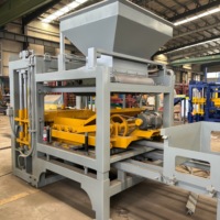 Machine de fabrication de blocs de ciment QT4-15, presse hydraulique automatique PLC pour l'usine de pavés et de blocs creux en béton