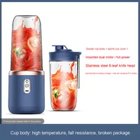 Vente en gros Mélangeur à jus multifonction portable moderne Presse-agrumes multifonction en acier inoxydable Petit presse-agrumes avec tasse de chargement