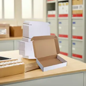 GMI ราคาโรงงานกระดาษลูกฟูกสีขาวขนาดเล็กกล่องจดหมายฟอยล์สีทองเคลือบด้านประทับตราการจัดส่งทางไปรษณีย์