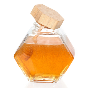 Pot De Miel De Miel Pot En Forme De Nid D'abeille En Verre Hexagonal Avec Louche En Bois et Couvercle En Bambou Vide 250ml 380ml <span class=keywords><strong>Cuisine</strong></span> Oem - Product Image 1