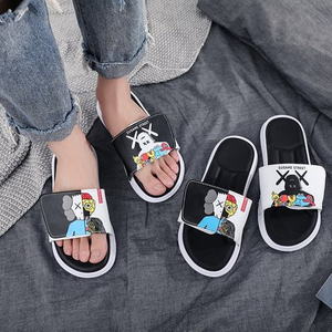 CHANCLETAS YEEZY KAWS X BEIGE OSCURO cybo - ShoppingHavana