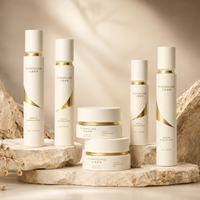 Flacon pulvérisateur et pots de crème pour le visage en verre noir à motif ligne dorée, 100ml 80ml 50ml 30ml 50g 30g, faible MOQ, direct usine