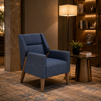 Fauteuil rembourré bleu pour l'hôtellerie, idéal pour les chambres d'hôtel, les suites, les halls d'accueil et les achats en gros