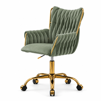 Fauteuil de détente en velours rouge, capitonné, dossier haut, siège pivotant réglable en hauteur, base en métal doré avec roulettes