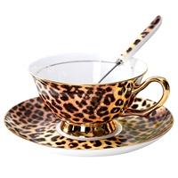 Ensemble tasse et soucoupe en porcelaine fine à imprimé léopard de luxe, avec anse et bordure plaqués or, tasse à café vintage pour l'après-midi, pour la maison et les cadeaux