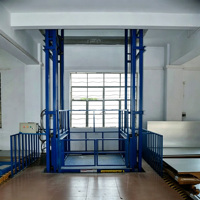 Plateforme élévatrice de marchandises robuste à rail de guidage, élévateur de fret électrique hydraulique pour le transport de marchandises en entrepôt sur plusieurs étages