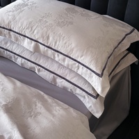 Parures de lit en coton haute densité 4 pièces, élégantes housses de couette jacquard, draps et taies d'oreiller pour chambre d'hôtel