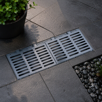 Grille de caniveau en fonte ductile robuste, rectangulaire à fentes, pour système de drainage routier municipal