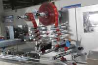 Machine d'emballage automatisée Nougat Bar Egg Roll Aligner Feeder Flow Pack Machine