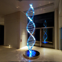 Sculpture en acier inoxydable poli sur mesure, thème double hélice de l'ADN, découpe laser, interprétation de la lumière et des ombres, code