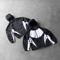 Conjunto Deportivo de 2 Piezas con Pantalones Desmontables, Chaqueta Cortavientos de Nailon Ligero y Transpirable con Diseño de Parches para Hombre