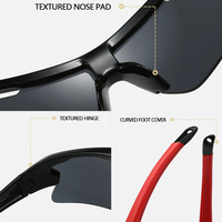 Lunettes de soleil sportives personnalisées OEM ODM avec monture PC, verres polarisés UV400, style futuriste pour le cyclisme