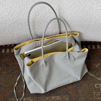Nouvelle collection Printemps/Été 2026 : Sac à dos multi-compartiments grande capacité en polyester, style coréen urbain et épuré, gris et jaune contrastés