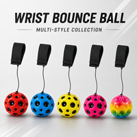Vente en gros de balles rebondissantes pour poignet avec sangle de poignet et cordon élastique, collection de jouets anti-stress multi-styles