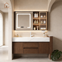 Projet hôtelier XINGRUO : Meuble de salle de bain sur mesure avec vasque intégrée en pierre frittée et miroir LED intelligent anti-buée