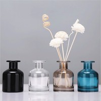 Diffuseur de parfum vide en verre teinté bleu, gris, noir, 150 ml, 200 ml, avec bouchon à vis ou bouchon doré, sérigraphie, vente en gros sur mesure