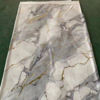 Fourniture par le fabricant d'une feuille de marbre Uv en PVC gaufré hautement brillant de 1220*2440*2.2mm pour la décoration intérieure
