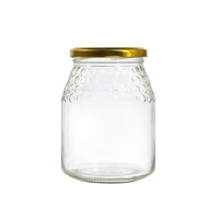 Vente en gros 740ml Prix d'usine fantaisie Pots de miel Pot à miel en verre pour 1 kg de miel avec torsion
