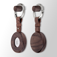Nouvelle conception de coque de protection antichoc anti-perte pour le localisateur Air Tag en gros avec porte-clés élégant