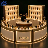 Comptoir de présentation de parfums rond, îlot ovale avec éclairage LED, finition en acier inoxydable doré, pour magasin de détail, centre commercial, kiosque, taille personnalisée