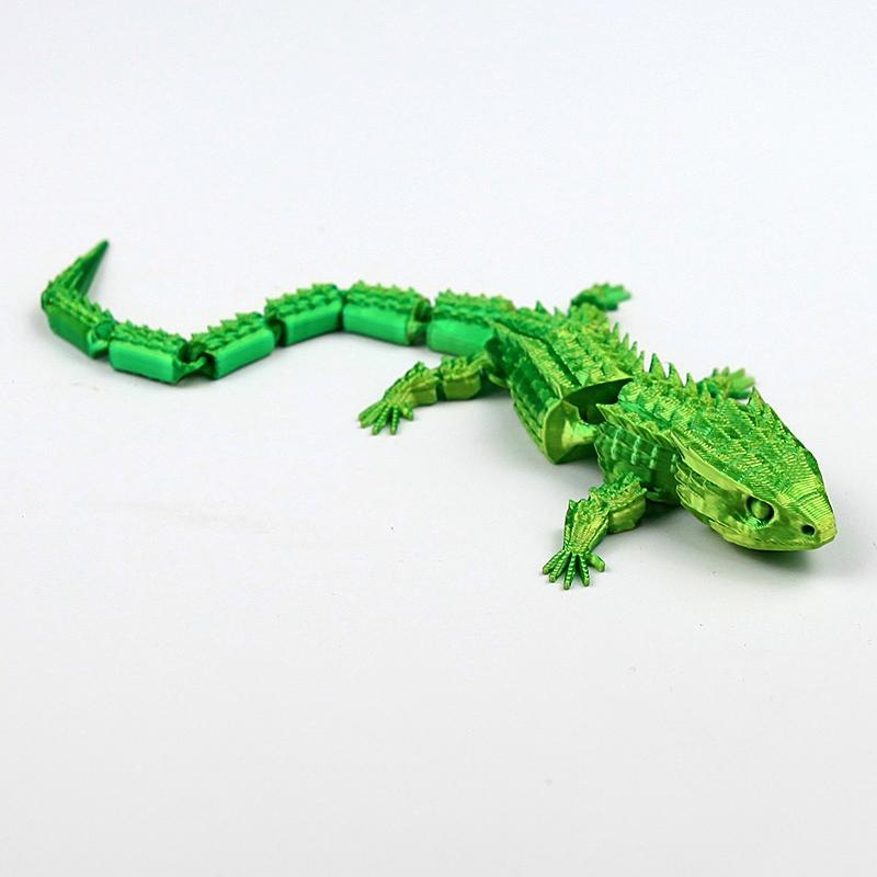 Lagarto verde amarillo de 22,5 cm.