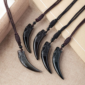Pendentif en <span class=keywords><strong>obsidienne</strong></span> <span class=keywords><strong>noire</strong></span> naturelle en forme de dent de loup, sculpté à la main, amulette en cristal pour la <span class=keywords><strong>protection</strong></span>, vente en gros - Product Image 1