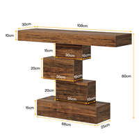 Une pile de livres sur la table console de la ferme, design de couloir, table console chinoise avec base géométrique
