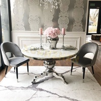 Ensemble de table à manger nordique de l'usine Xuanzhen, mobilier de luxe pour boutique, tables à manger rondes modernes en marbre de haute qualité avec 4 chaises