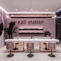 Présentoir personnalisable pour salon de manucure avec comptoir en pierre rose et bleue avec éclairage LED