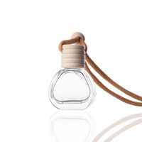 Diffuseur de parfum de voiture de 14ml en gros bouteille avec corde suspendue Unique fantaisie vide pour vernis à ongles huile bouchon à vis étanchéité