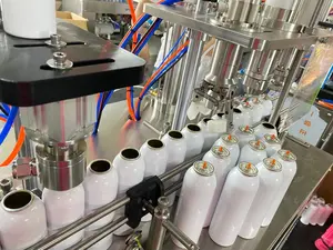 Máquina semiautomática de llenado de latas de aerosol, para pintura en aerosol