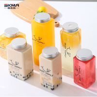 Bouteilles jetables pour animaux de compagnie de logo de forme personnalisée en gros de haute qualité bouteilles de thé à bulles de jus d'eau épaissie