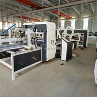 Les fabricants chinois sont spécialisés dans la machine de pliage et de collage de Carton avec mécanisme automatique de planche à ongles pour boîte de couleur ondulée