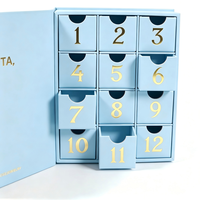 Babyblauer Schmuck-Adventskalender 12-Tage-Countdown-Geschenkbox mit Goldfolien-Zahlen in Buchform für Weihnachten und Feiertage