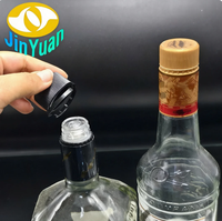 Op maat gemaakte 58mm plastic afsluitingen met tamper-evident band en logo in diverse kleuren beschikbaar voor whisky, wodka, tequila en brandewijn