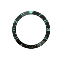 Montre 007 38 mm à double fuseau horaire noire avec insert de lunette en céramique luminescent vert et fonction inclinée