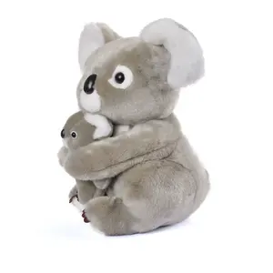 Pequeño y encantador Koala oso de peluche de juguete del bebé con mamá.