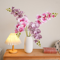 Vente en gros de fleurs d'orchidées artificielles à 7 têtes, effet réaliste, tige de fleur de phalaenopsis artificielle, pour la décoration de mariage, de la maison et d'événements