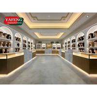 Présentoirs et vitrines sur mesure de haute qualité pour salons de coiffure et perruques, fournis par un fabricant de Guangzhou
