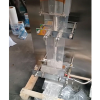 Machine de remplissage et d'emballage automatique de sachets d'eau de 500 ml à moteur pour eau minérale et sachets souples