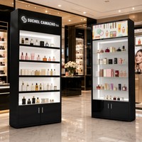 Vitrine à parfum moderne et lumineuse, étagères à niveaux, design mural, finition peinture au four, couleur blanche, comptoir personnalisable pour