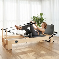 Queenlife Commercial North American White Maple Pilates Reformer Machine avec boîte d'assise, planche de saut et ressorts allemands de qualité studio