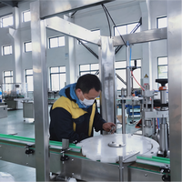Ligne de production de remplissage d'aérosols entièrement automatique à commande PLC haute précision pour bouteilles de GNC/GNL/GPL, produits chimiques et boissons