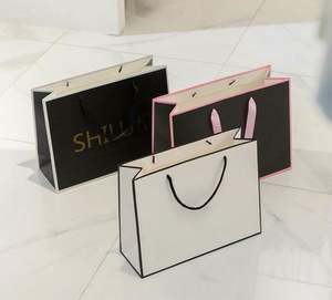 Wholesale Fashion Custom Boutique Clothes Shopping Gift Packaging Coated <b>Paper</b> <b>Bag</b> - Product Image 5