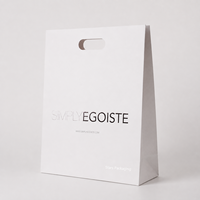 Sacs en papier fantaisie de haute qualité, personnalisés, avec poignées découpées, pour cosmétiques, soins de la peau, rouges à lèvres, sacs cadeaux, design blanc, emballage de beauté