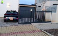 Portes télescopiques modernes simples et imperméables en alliage d'aluminium de haute qualité, avec revêtement en poudre, commande à distance, design automatique
