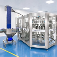 Machine de remplissage de boissons gazeuses 12000BPH CSD, ligne de lavage, remplissage et bouchage 3 en 1 pour bouteilles PET